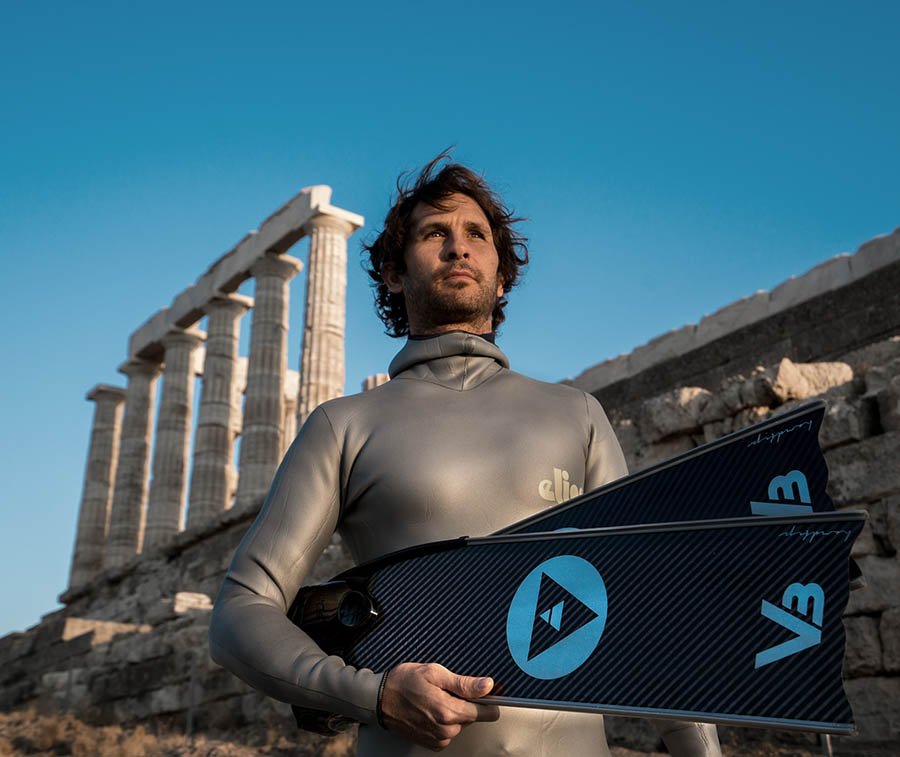 Freediver posing with Alchemy V3-30 Carbon Fiber Bifins, in Silver