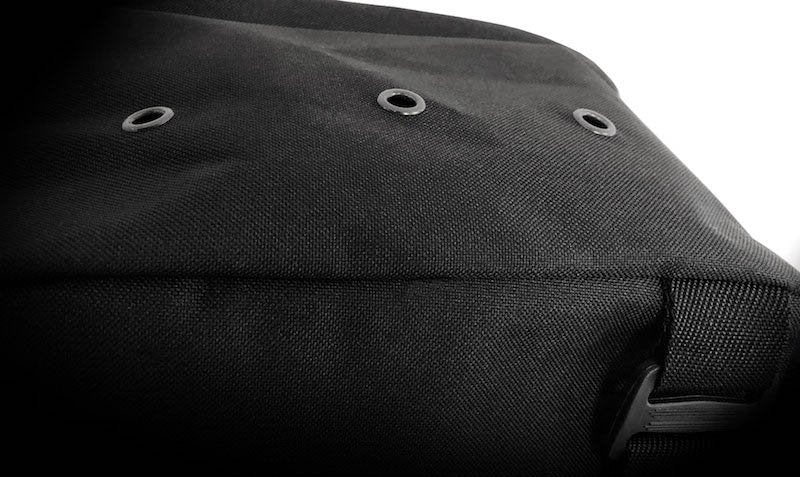 Alchemy The Bag, with padding, showing drain holes for retained water